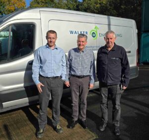 Stood in front of a silver van side-on showing the Walker Engineering livery are three men - Andy Ritson, General Manager of Walker Engineering, Bill Atkinson, SIA Chief Executive and Andy Walker, Chairman of Walker Engineering